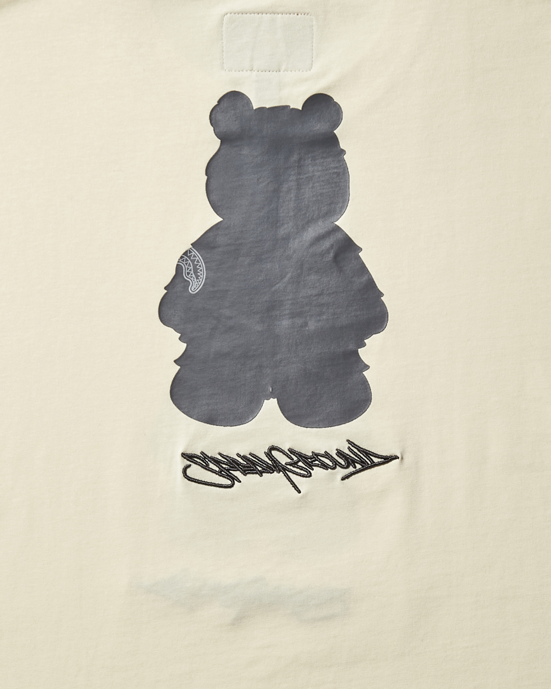 SHORT SLEEVE GRAPHIC MONEY BEAR T-SHIRT (APRICOT)